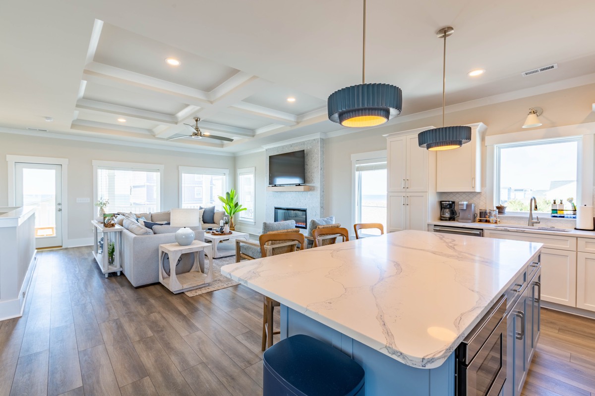 Open kitchen and living area with a large island