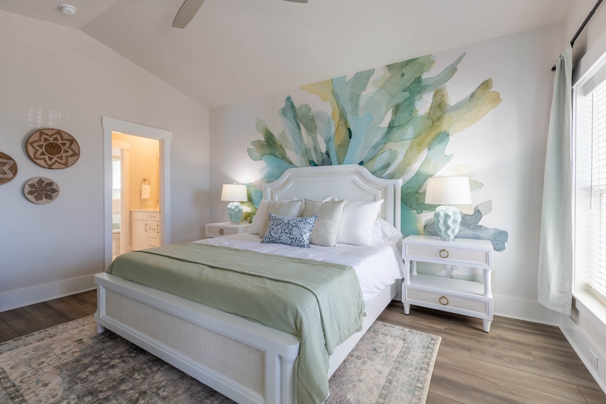Bedroom with a watercolor accent wall