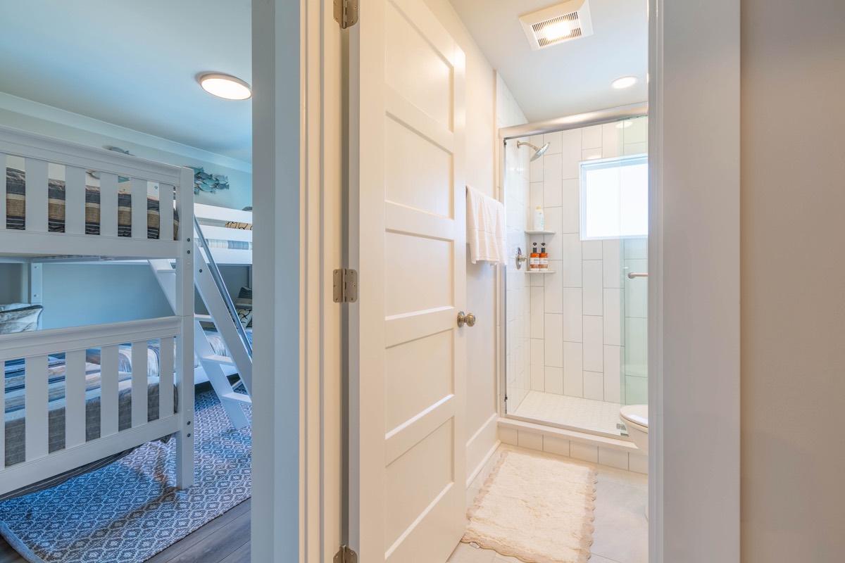 Bunk room with an en-suite shower