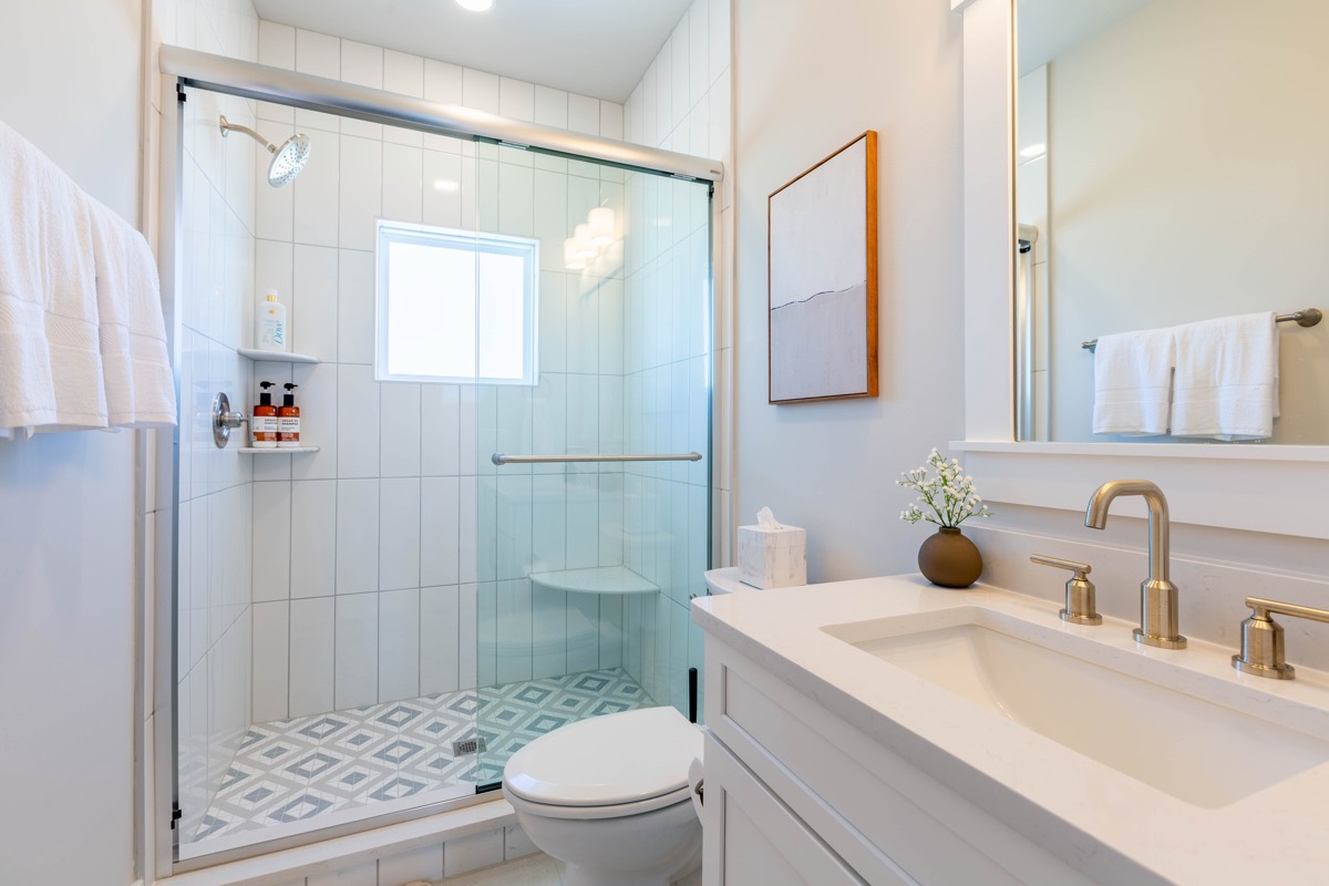Bathroom with tiled walk-in shower